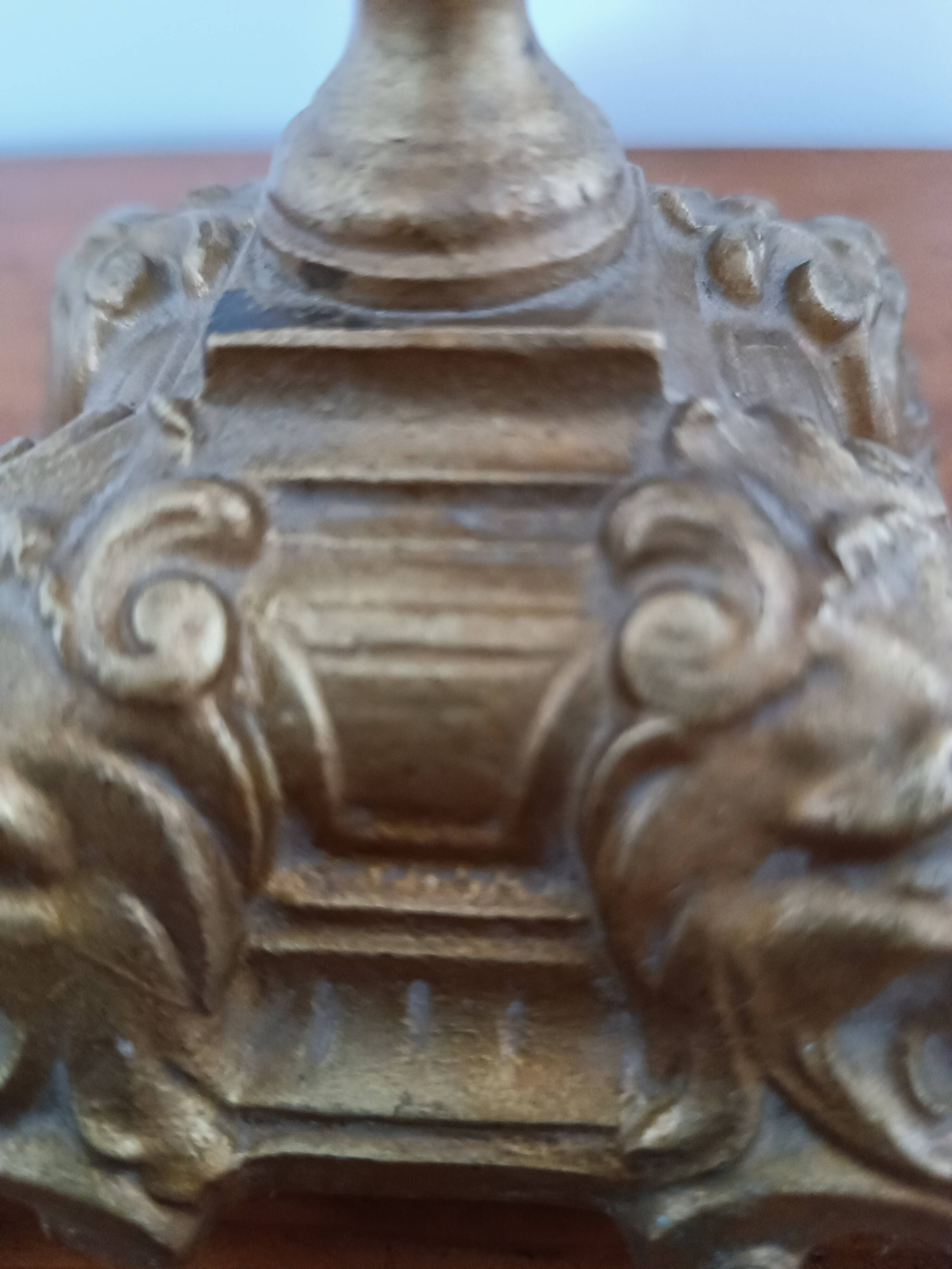 Bronze candlestick with lion head decoration