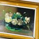 Pair of small framed vintage floral oils