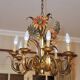 Set of painted metal chandeliers with flower decor