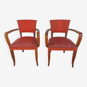 pair of orange-red bridge armchairs