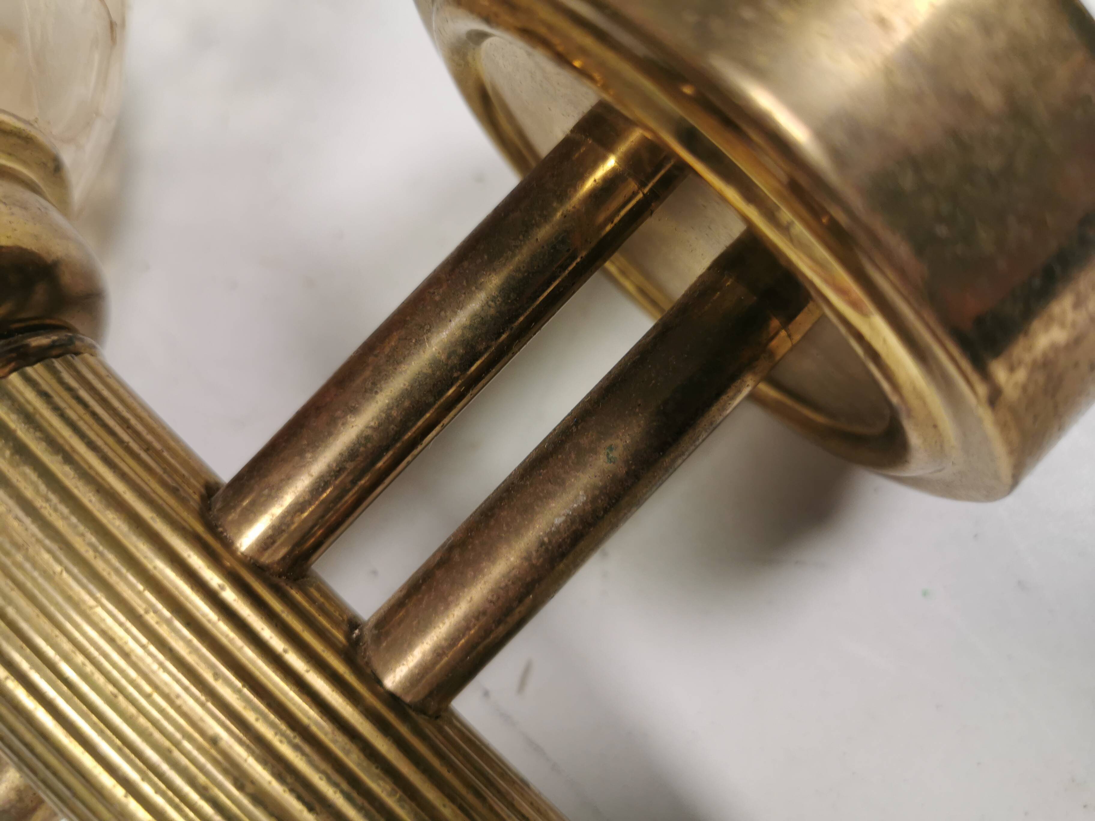 Older wall lamp in metal, brass and “cracked” glass.