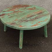 Round coffee table in old green wood