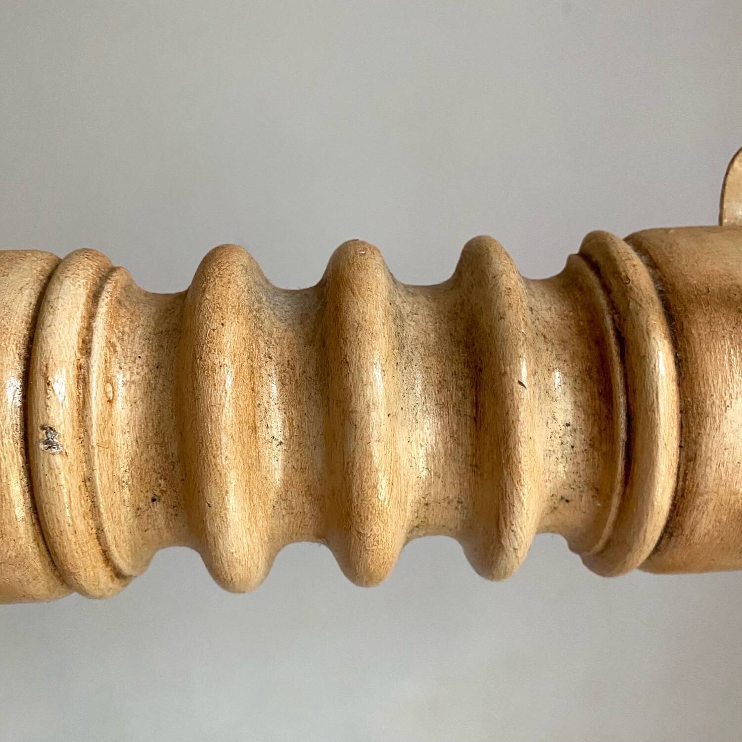Turned wood wall coat rack