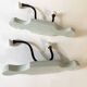 Antique metal and porcelain coat hooks, painted wooden support