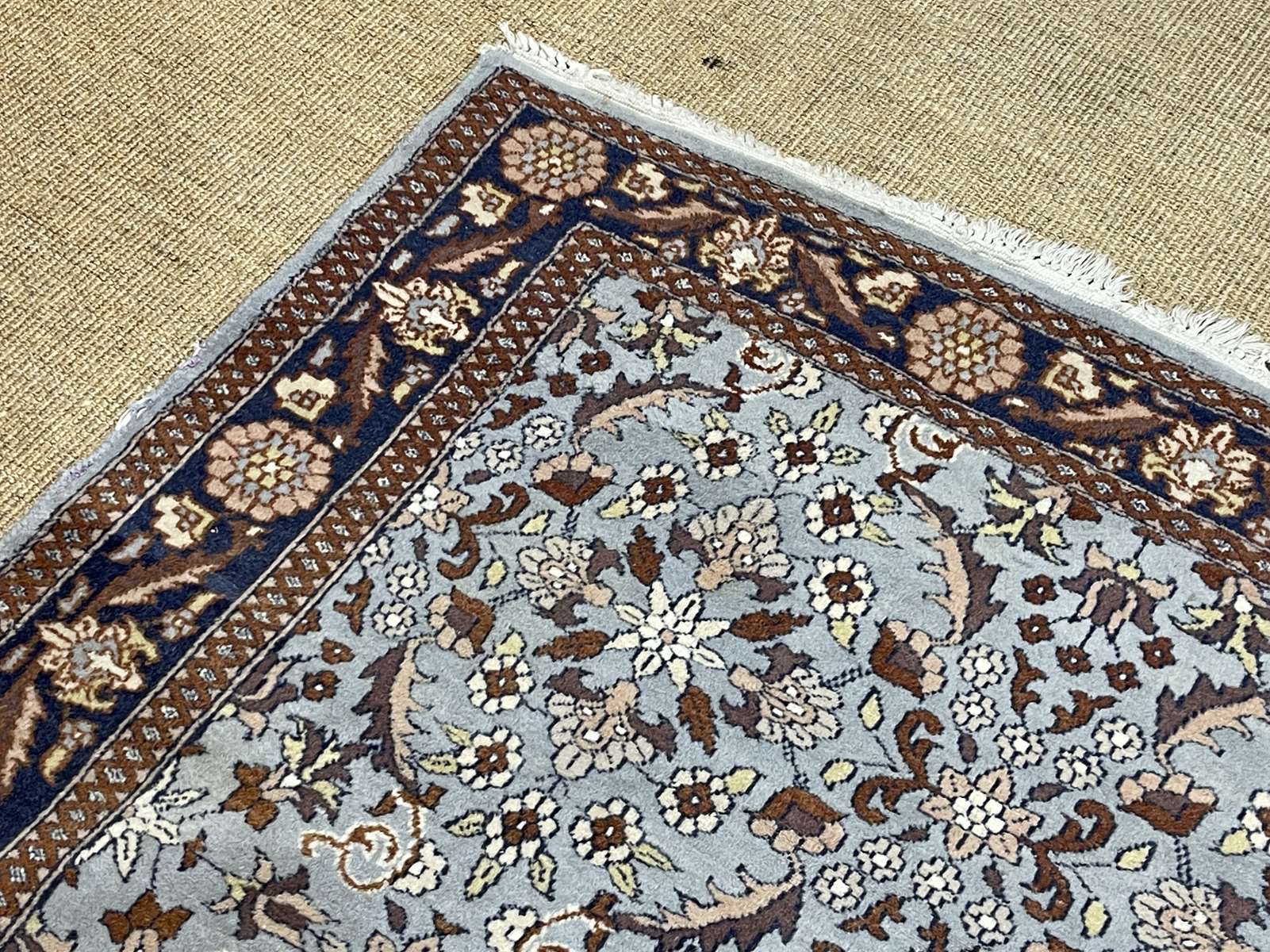Handmade wool oriental carpet (wear defects)