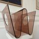 Plexiglas magazine rack by Michel Dumas for Rochebobois