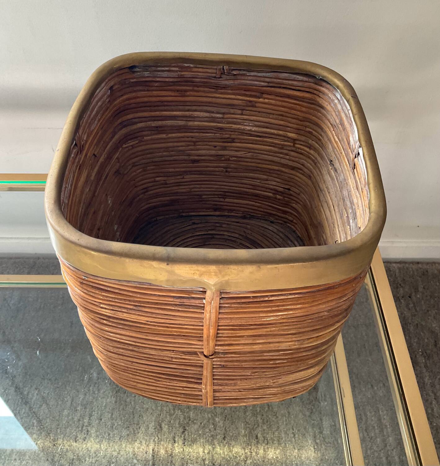 Rattan plant pot rimmed with brass from the 60s and 70s