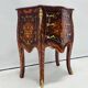 Marquetry chest of drawers with inlay in Louis XV style