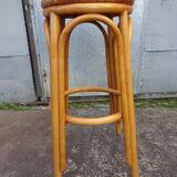 High bar stool in woven rattan