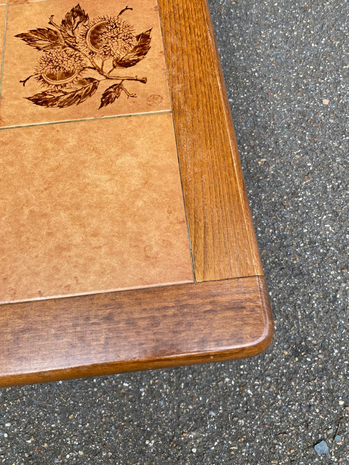 Solid wood and ceramic coffee table from the 1970s.