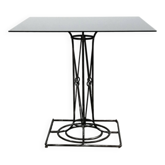 Wrought iron dining table with its black square glass top, vintage 1980