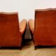 Paire de fauteuils a moustache club cuir
