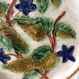Old barbotine dessert plate. Floral patterns
