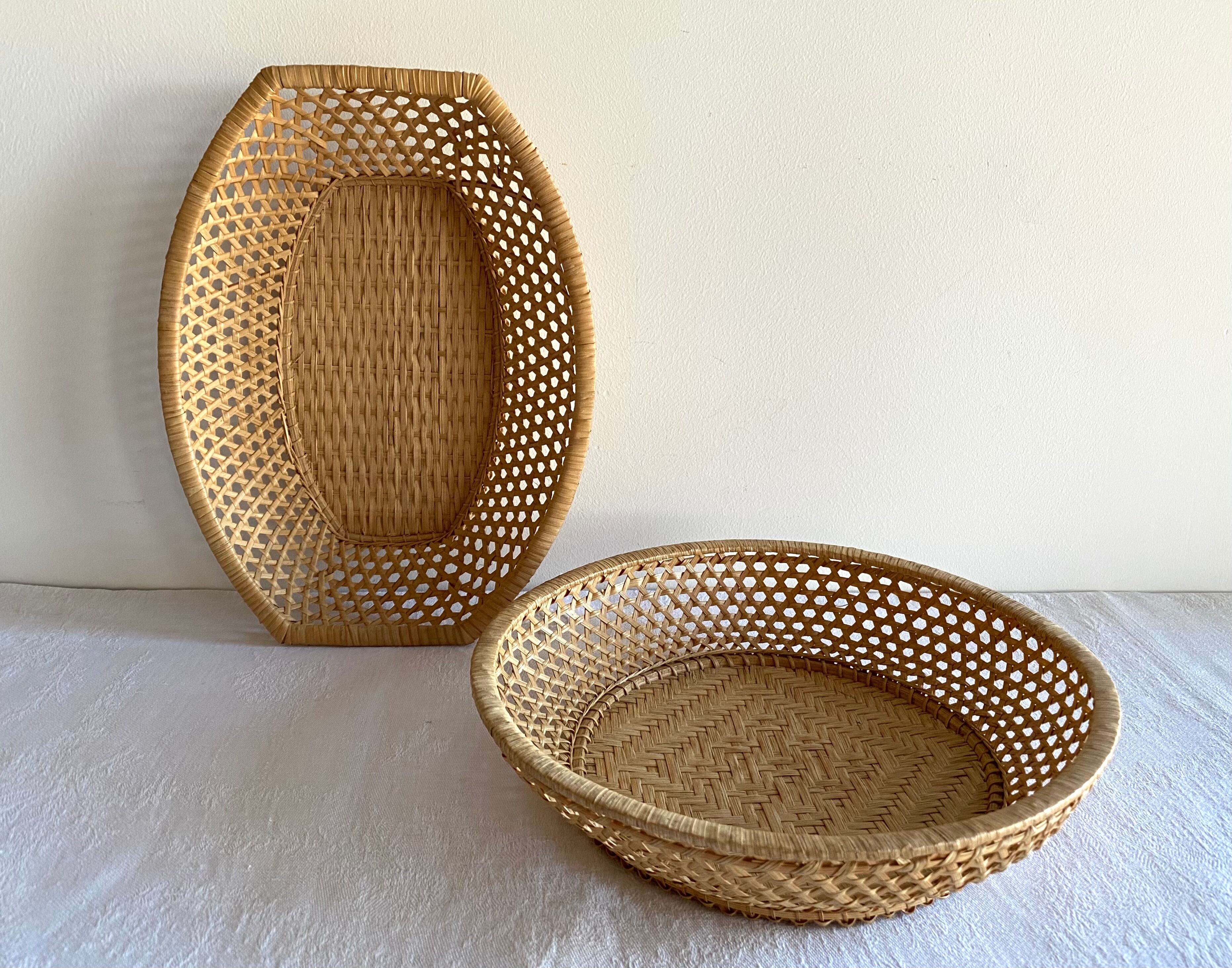 Pair of vintage braided rattan baskets