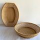 Pair of vintage braided rattan baskets