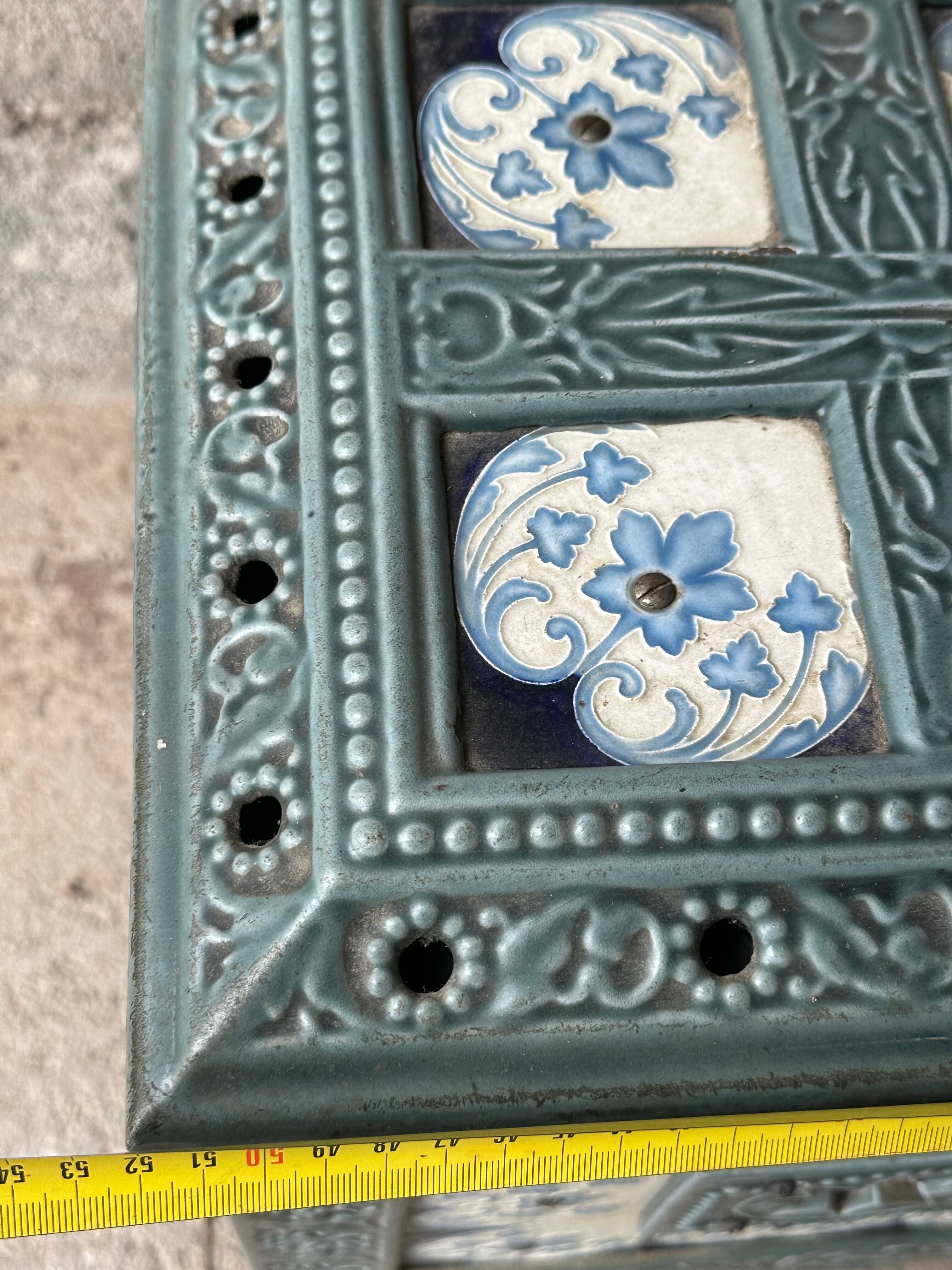 Enamelled cast iron wood stove and earthenware Mirus