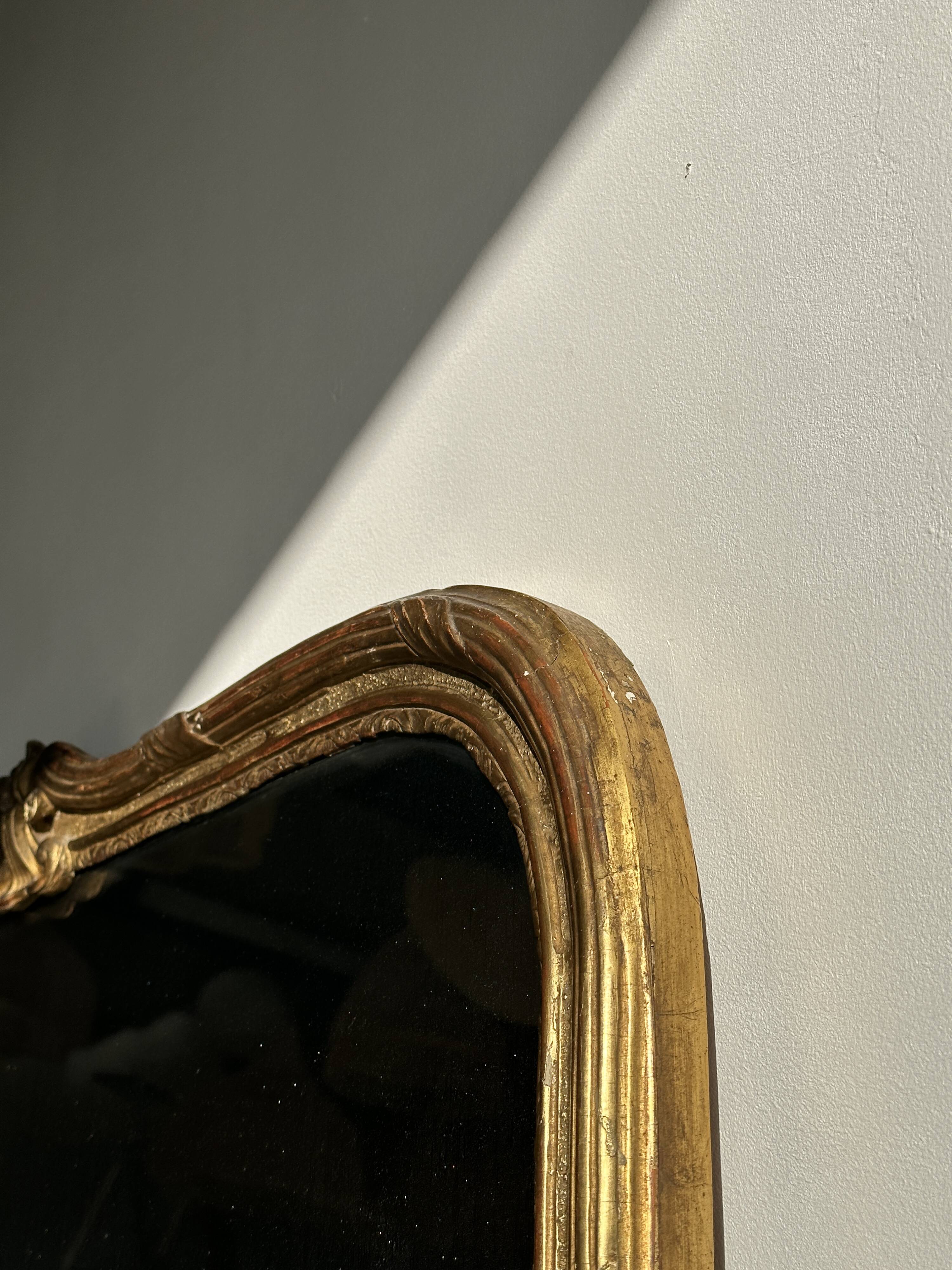 Large gilded mirror 19th century rounded corners mercury glass Louis XVI style
