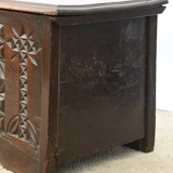 Antique chest in carved wood