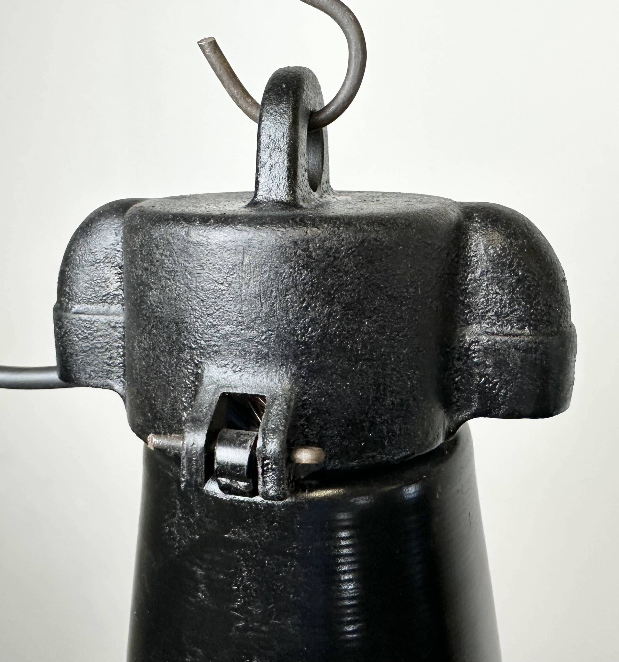 Industrial black pendant factory lamp with cast iron top, 1970s