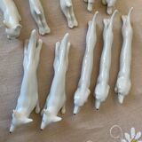 Set of 11 Art Deco zoomorphic knife holders
