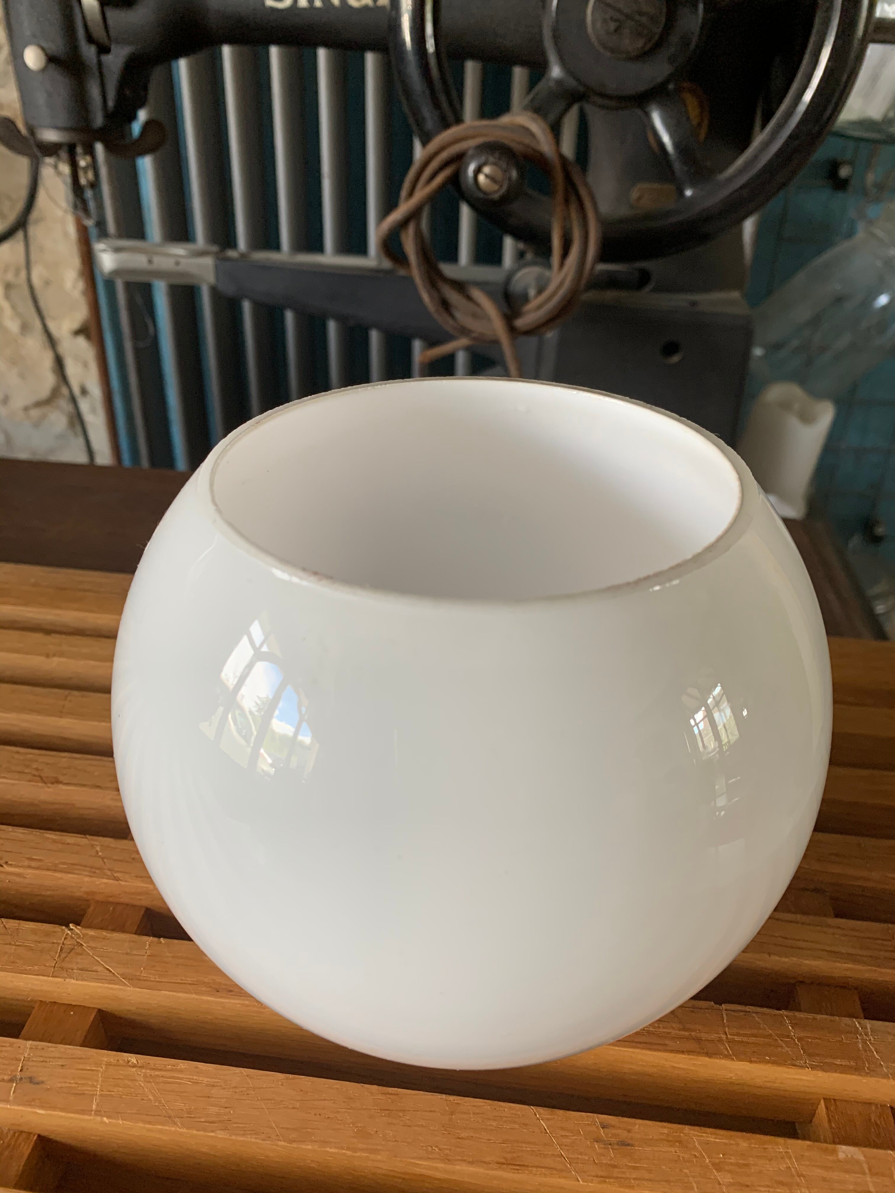 Globe ball in vintage white opaline