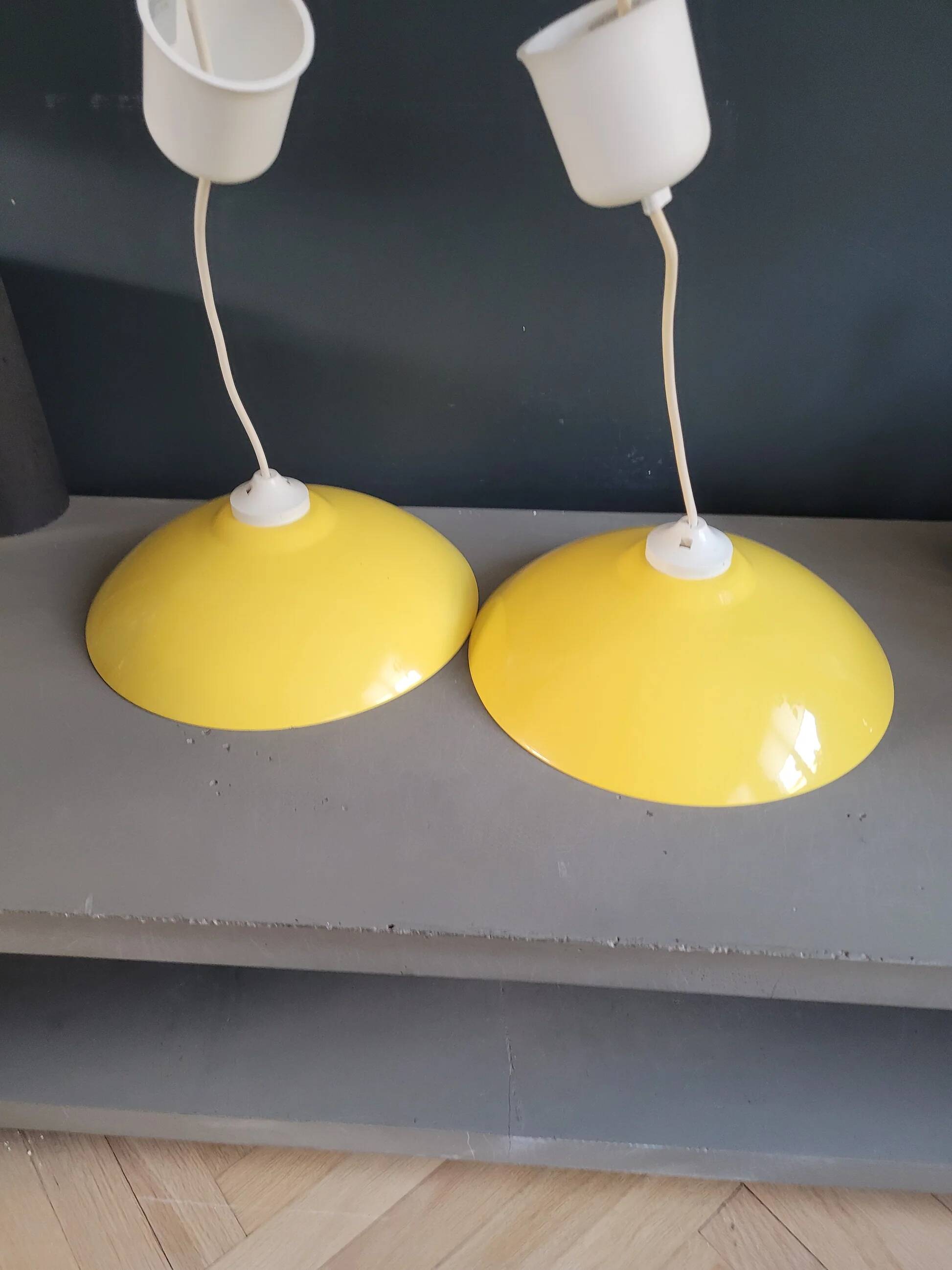 Pair of yellow lacquered metal pendant lights