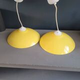 Pair of yellow lacquered metal pendant lights