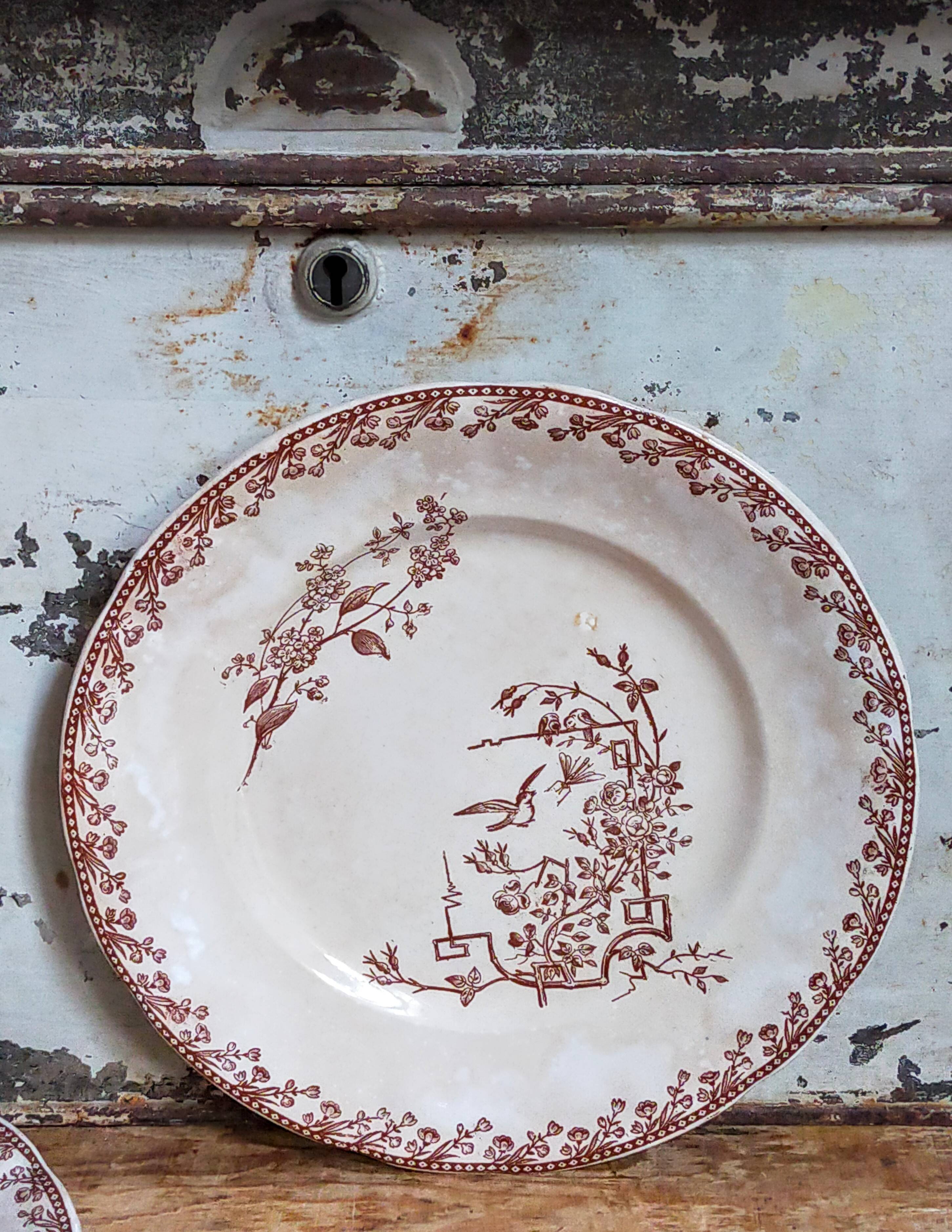 Seven iron earth dessert plates with birds ffPexonne late 19th century