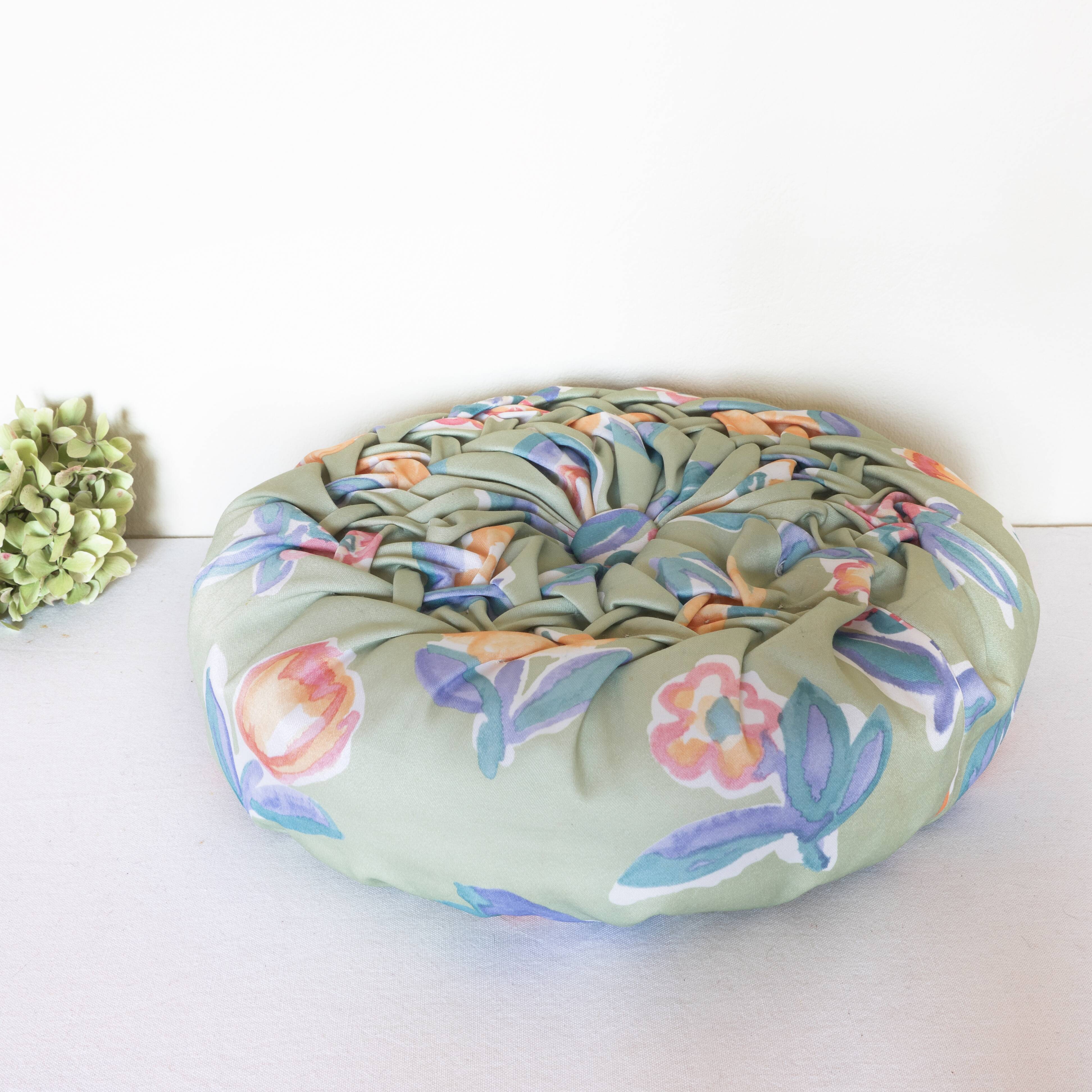 Round silk cushion floral pattern