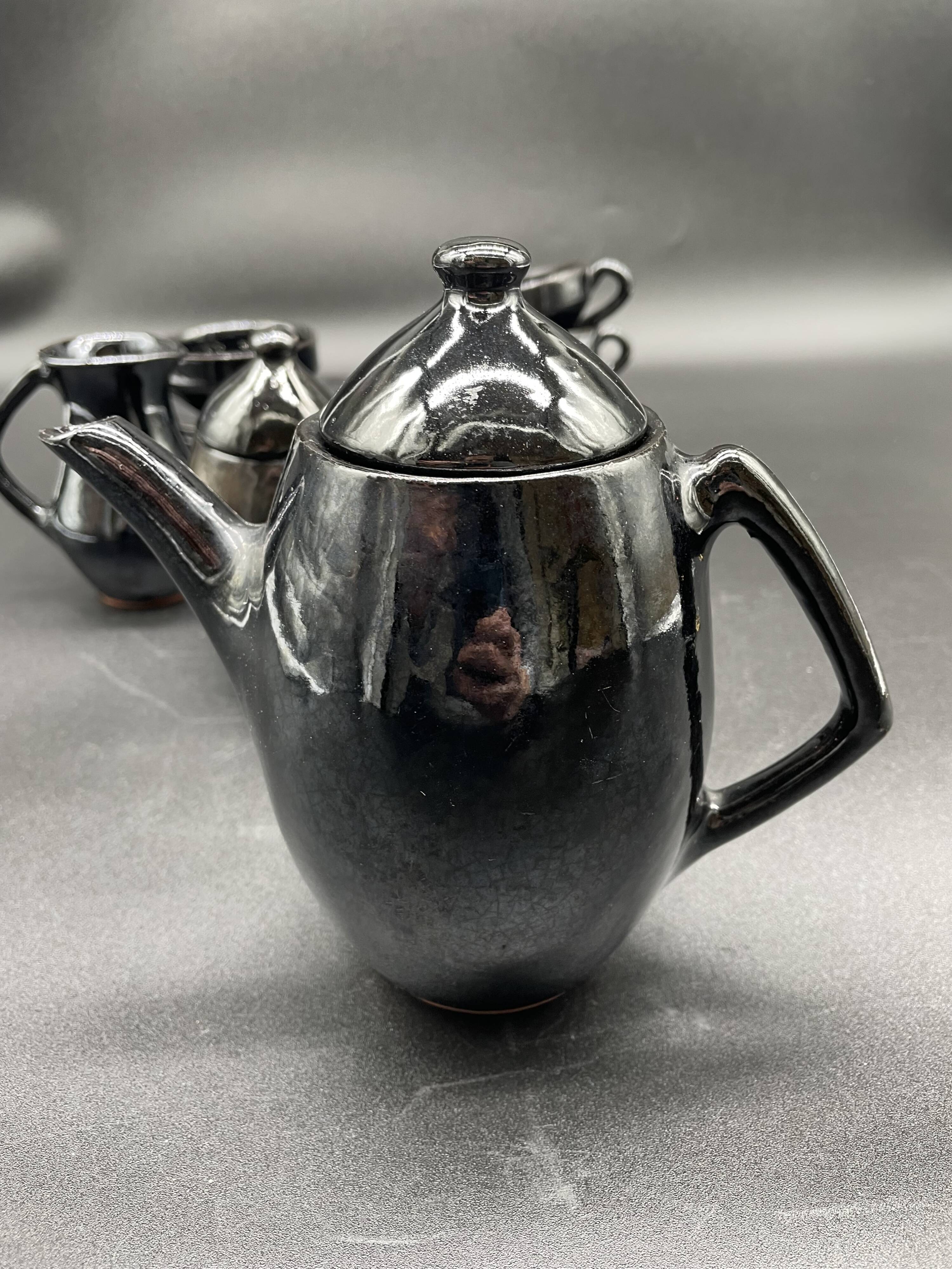 Brutalist black ceramic coffee service – Modernist design