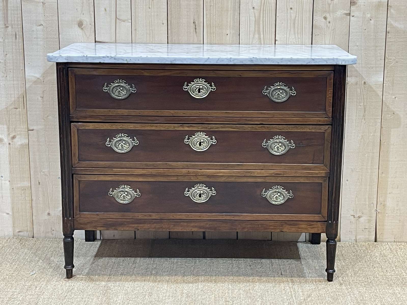 Louis XVI XIXth chest of drawers in mahogany and walnut and white marble top
