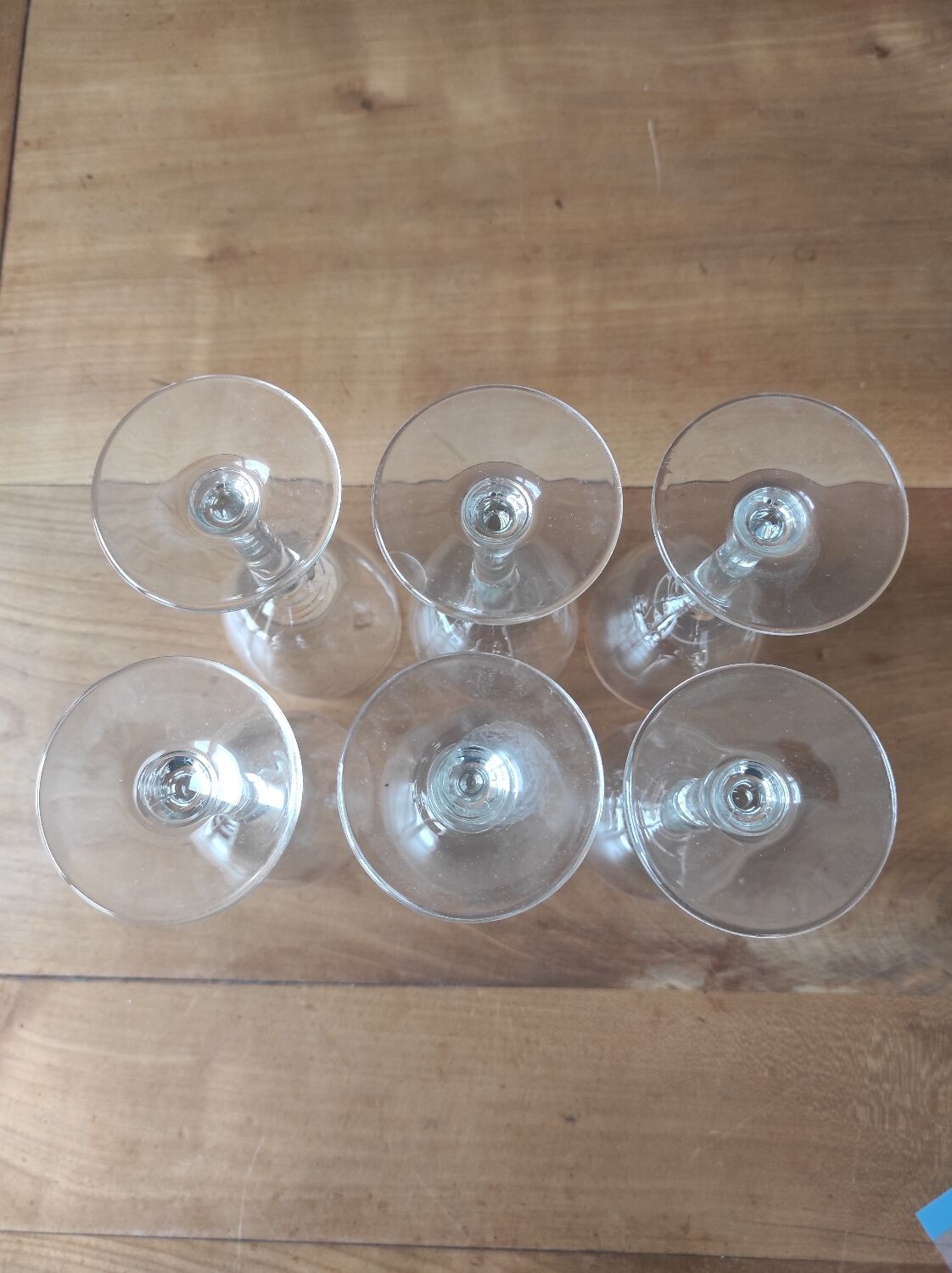 Set of 6 glasses with gold band decorations.