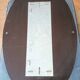 Vintage oval smoked glass mirror