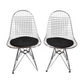 chrome metal design chairs and black skai seat