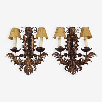 Pair of wrought iron sconces "Venetian masks"