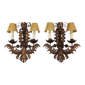 Pair of wrought iron sconces "Venetian masks"