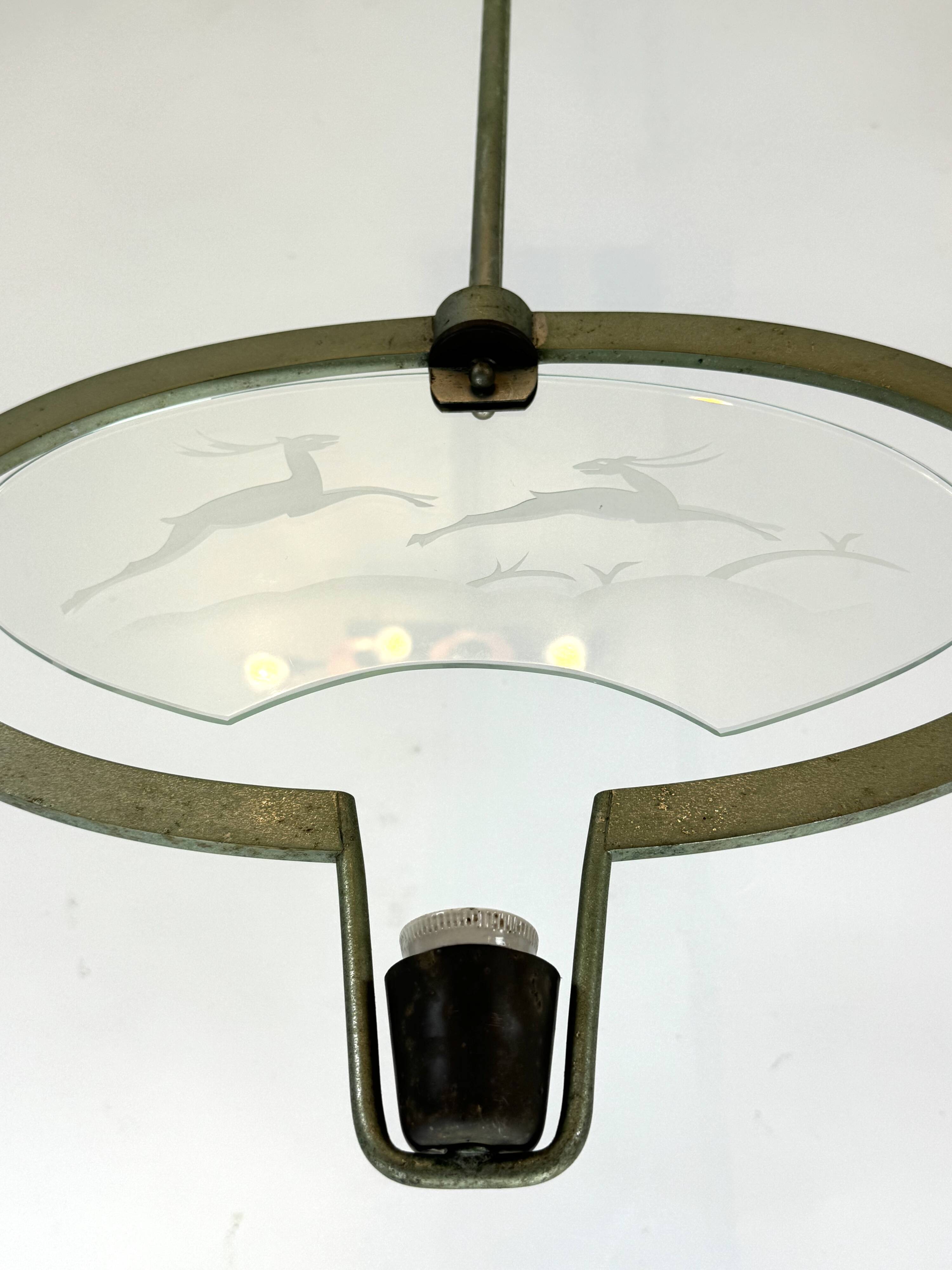 Pietro Chiesa, Art Deco chandelier in solid lacquered brass and glass. Italy 1930s