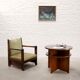 Table basse circulaire moderniste française avec étagères, vers 1935