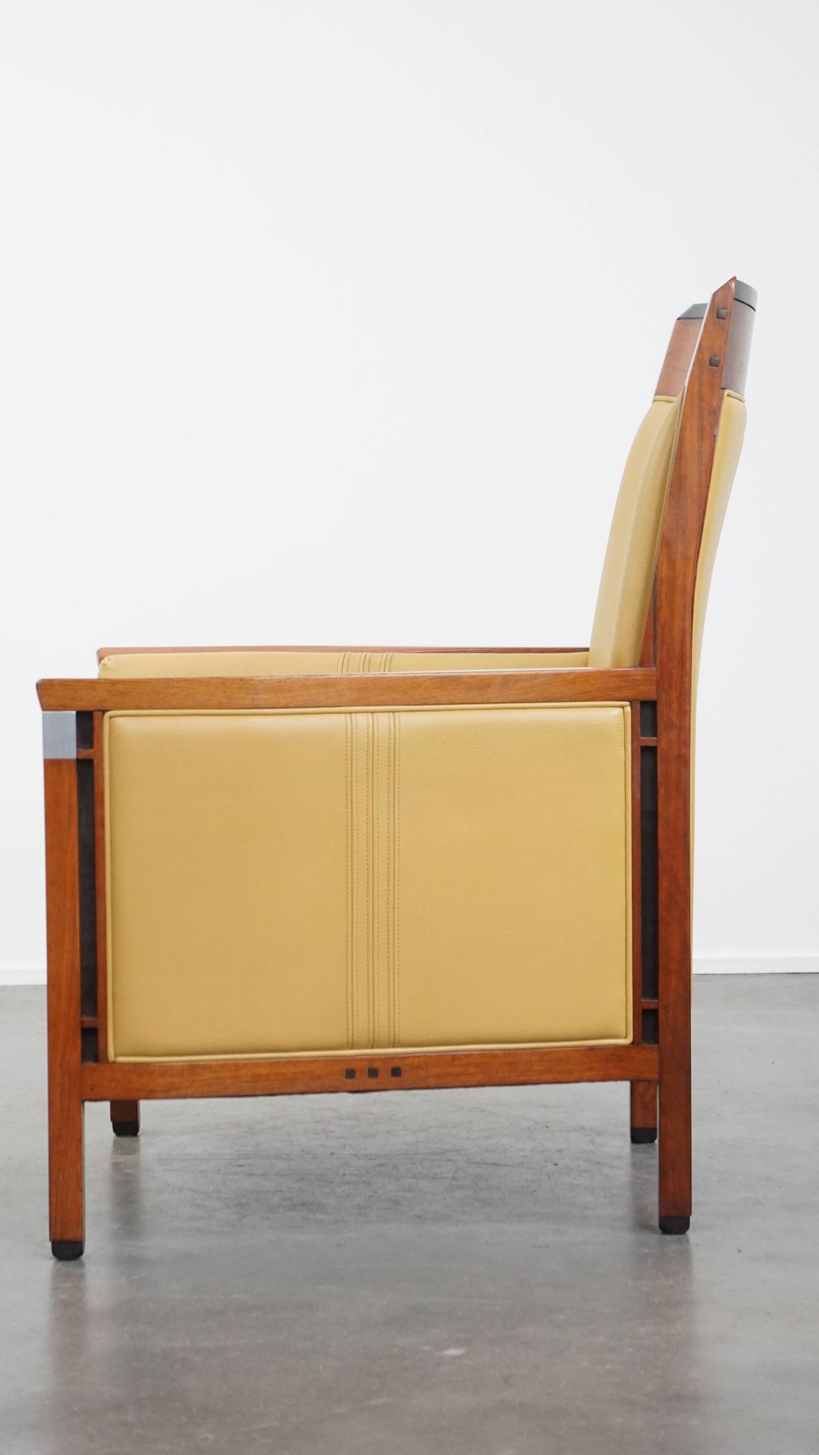 Art Deco armchair in yellow leather with high back