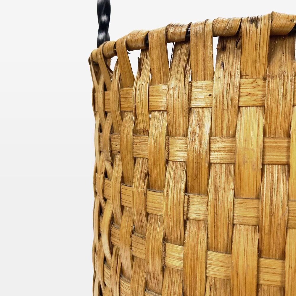 Braided bamboo umbrella holder