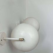 Pair of vintage adjustable wall lights, brass and white metal, France 1970