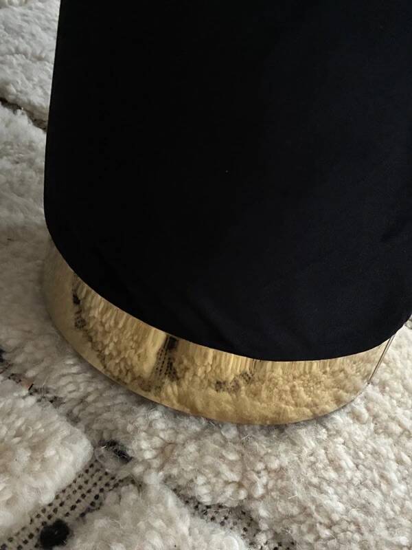 Black velvet cylindrical pouf