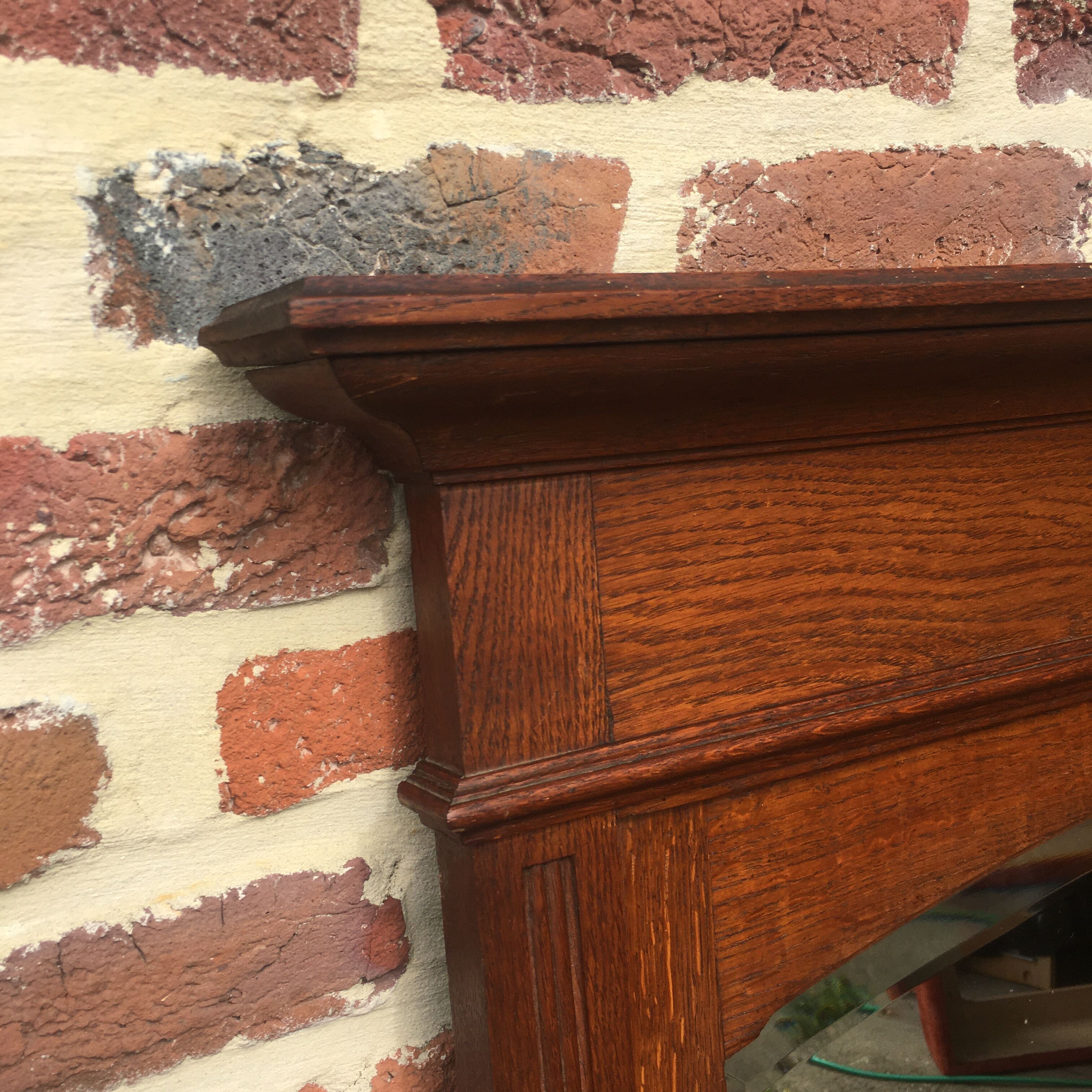 Beveled fireplace mirror