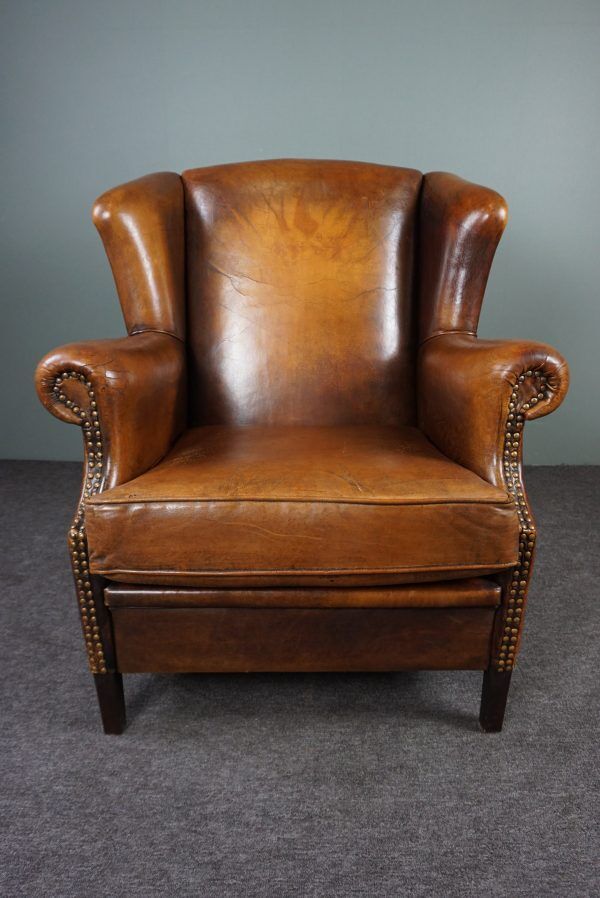 Armchair + sheepskin pouf