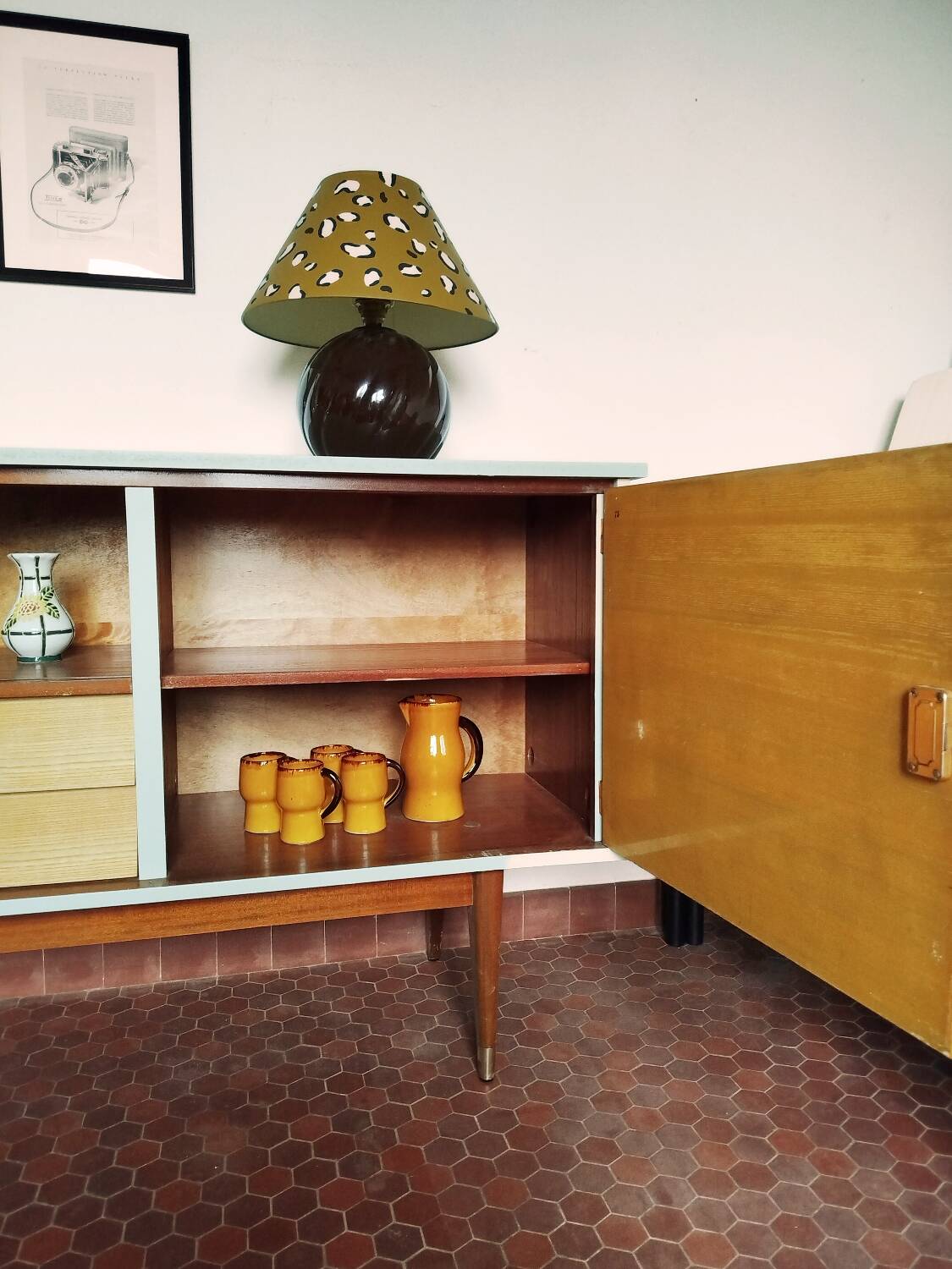 Wooden sideboard in soft green