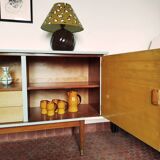 Wooden sideboard in soft green