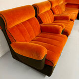 Modular vintage orange corner sofa, 1970s pop design.