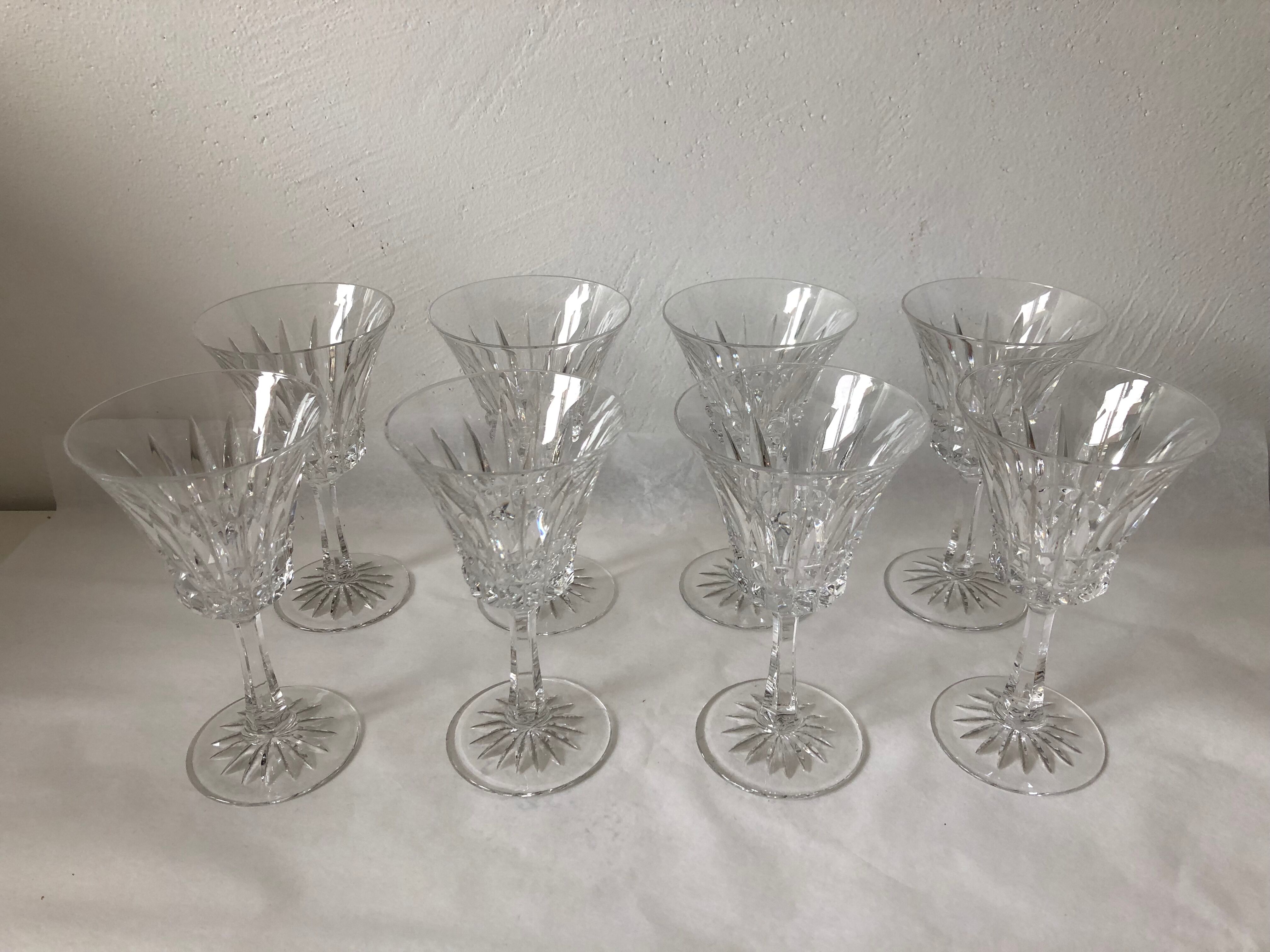 Eight Baccarat crystal wine glasses