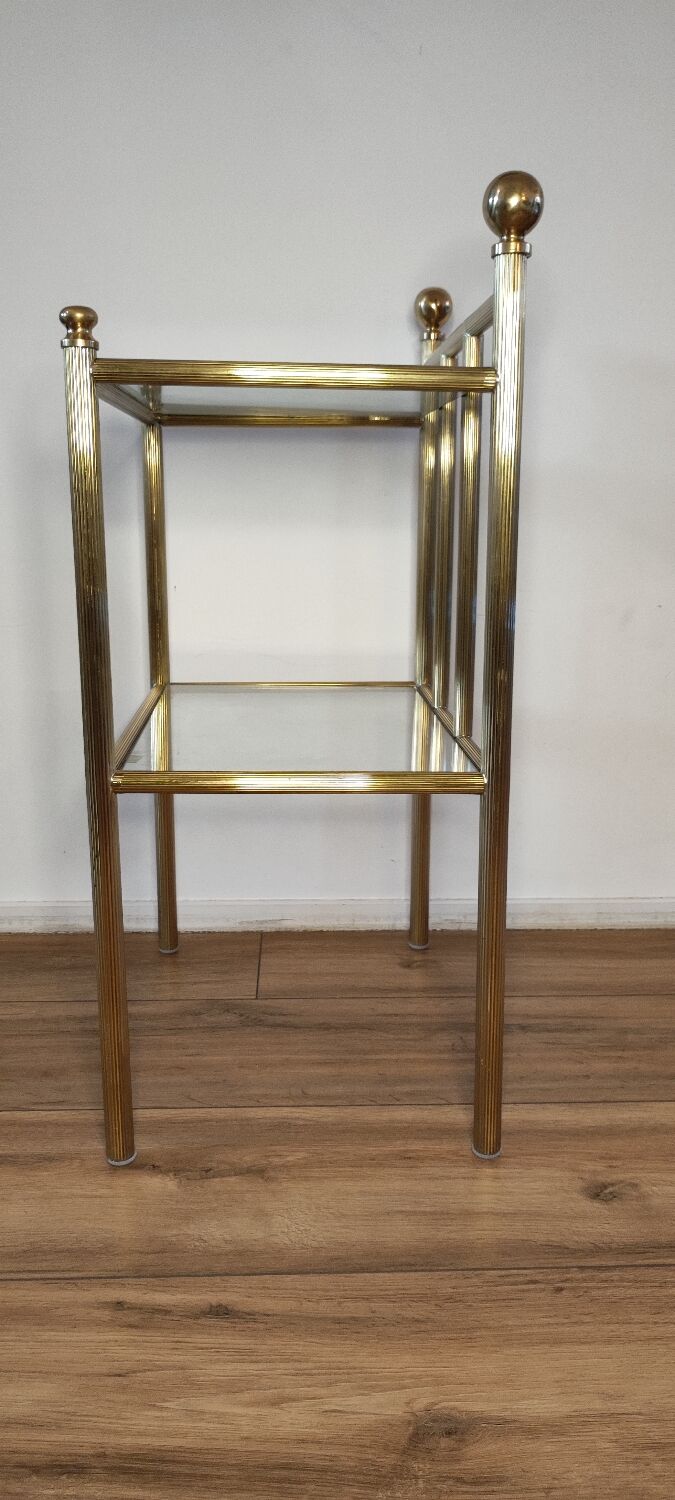 Bedside table in brass and glass.