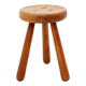 Brutalist tripod stool in solid wood, around 1960.